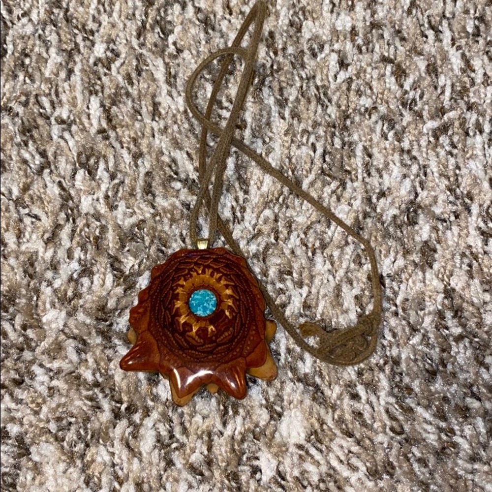 Glow in the dark turquoise pinecone pendant